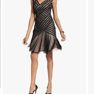 London Times V neck cocktail dress with bias cut and mesh overlay.